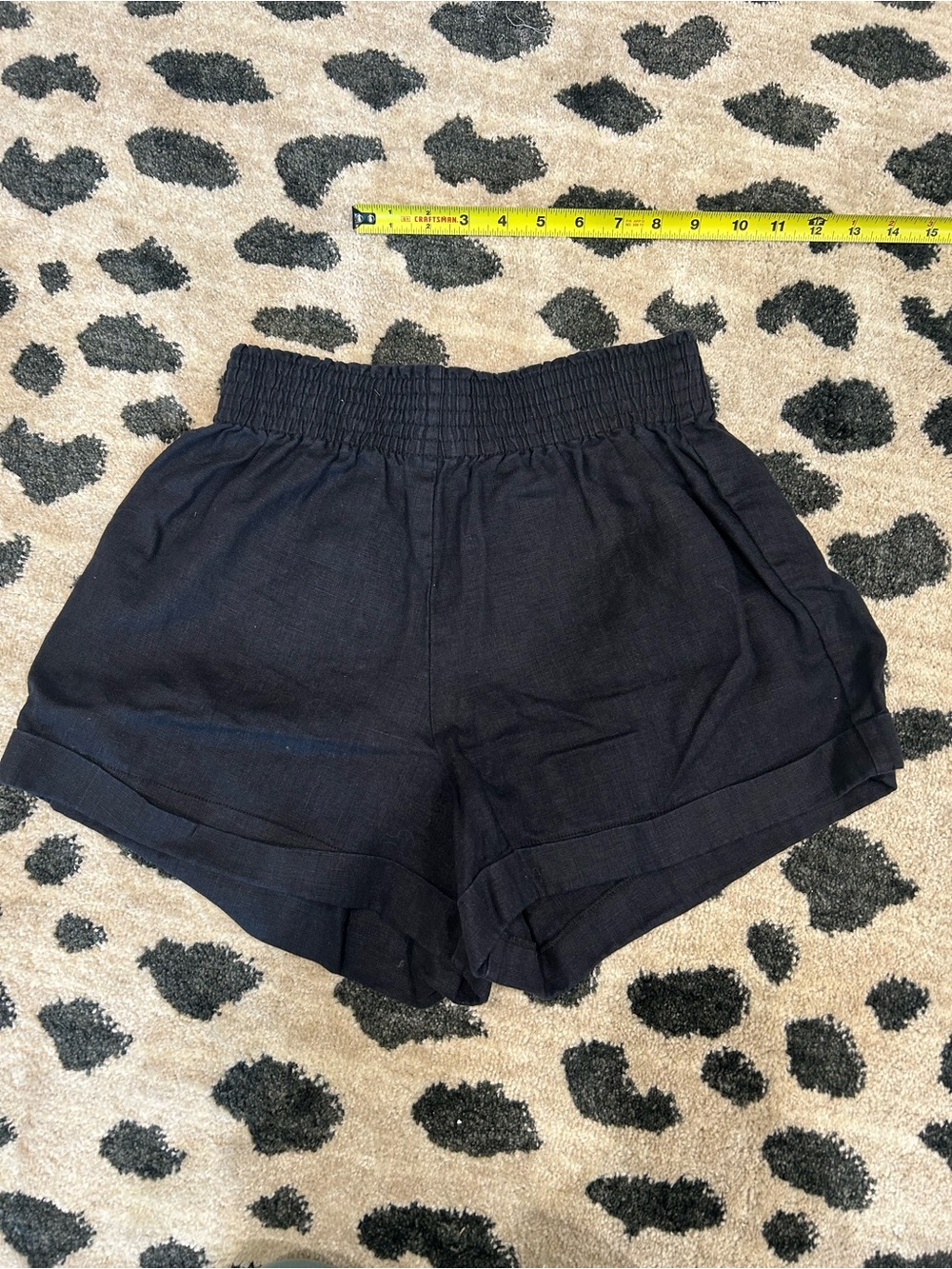Reformation Black High-Waist Smocked Linen-Blend Shorts
